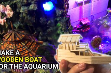 Make a decorative wooden boat for an aquarium with waterfall using ice cream sticks