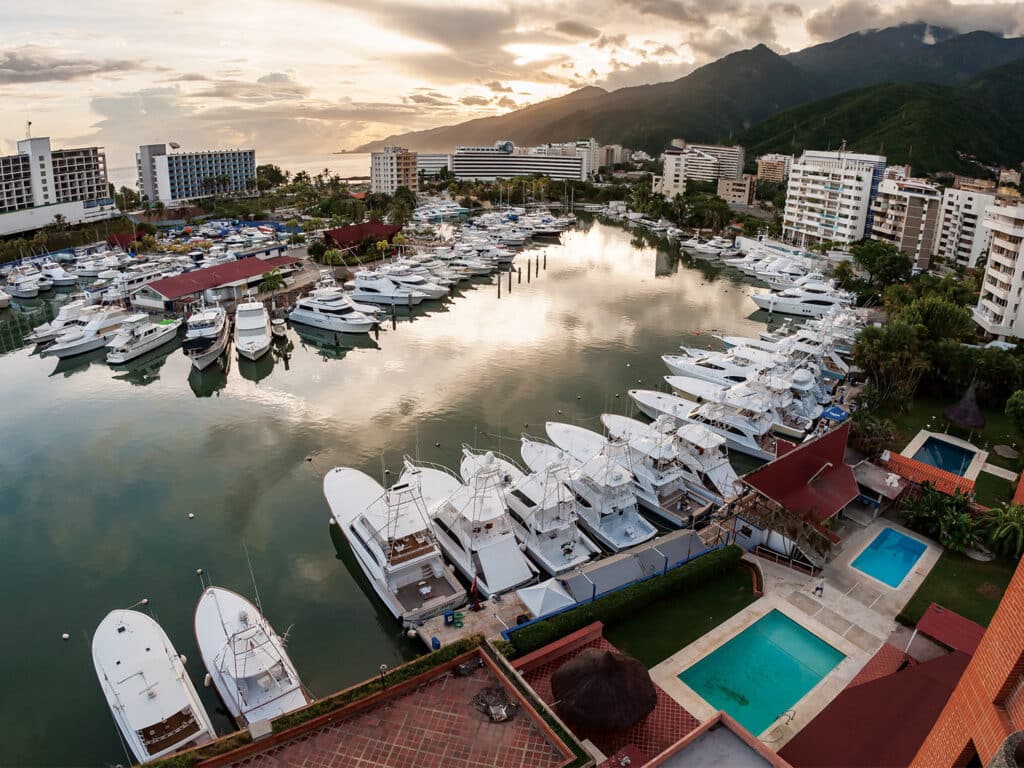 Aerial view of Marina Portofino. Sport-fishing boats can be seen docked side-by-side.