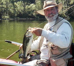 Angler with bass